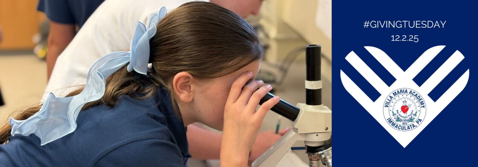 Girl looking in microscope